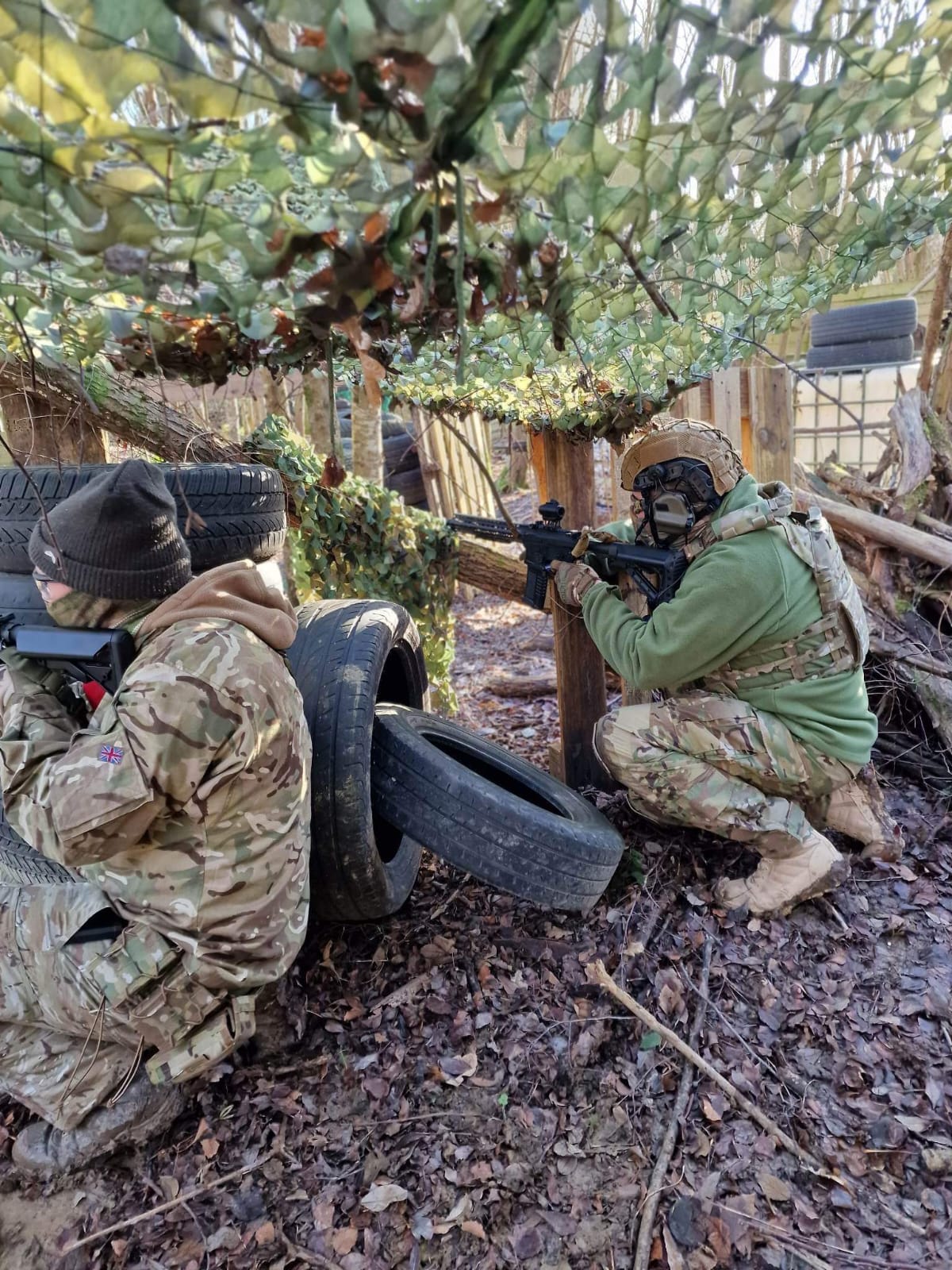 A player kneeling in the undergrowth