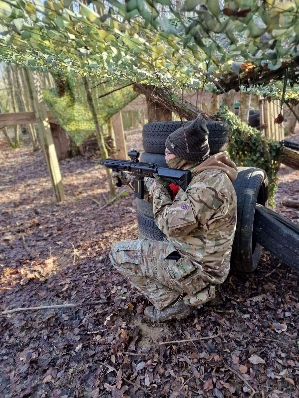 A player at the woodland edge
